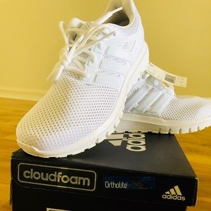 Size 10 1/2 White on White Adidas. Brand New.